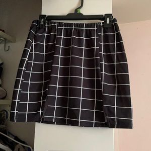black and white skirt with slits down the front